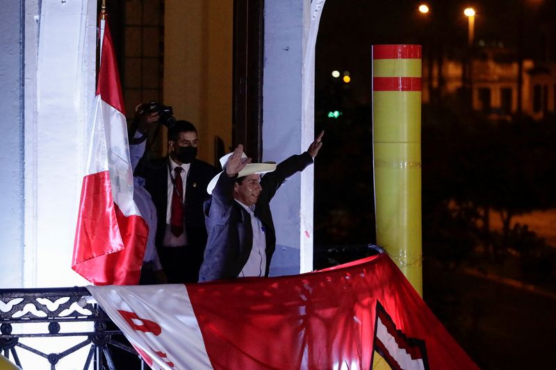 &copy; Reuters. Peru's presidential candidate Pedro Castillo gestures to supporters from the headquarters of the "Free Peru" party in Lima, Peru June, 15, 2021. REUTERS/Angela Ponce