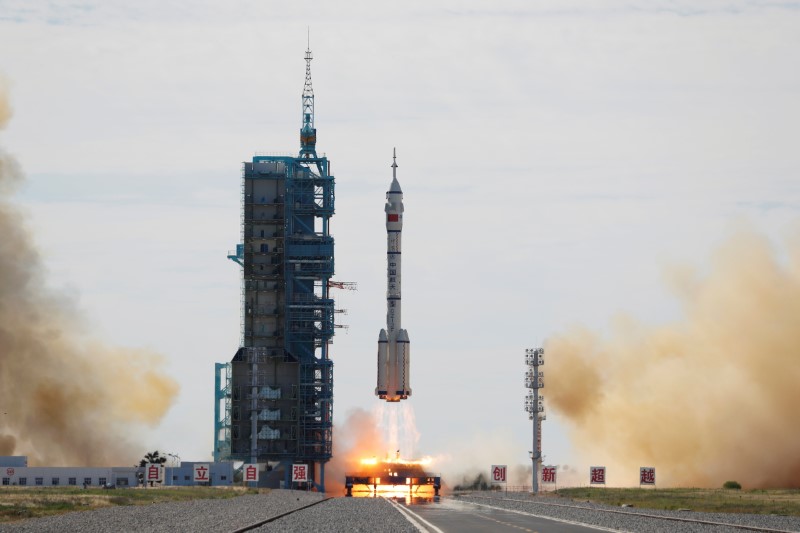 &copy; Reuters. The Long March-2F Y12 rocket, carrying the Shenzhou-12 spacecraft and three astronauts, takes off from Jiuquan Satellite Launch Center for China's first manned mission to build its space station, near Jiuquan, Gansu province, China June 17, 2021.   REUTER