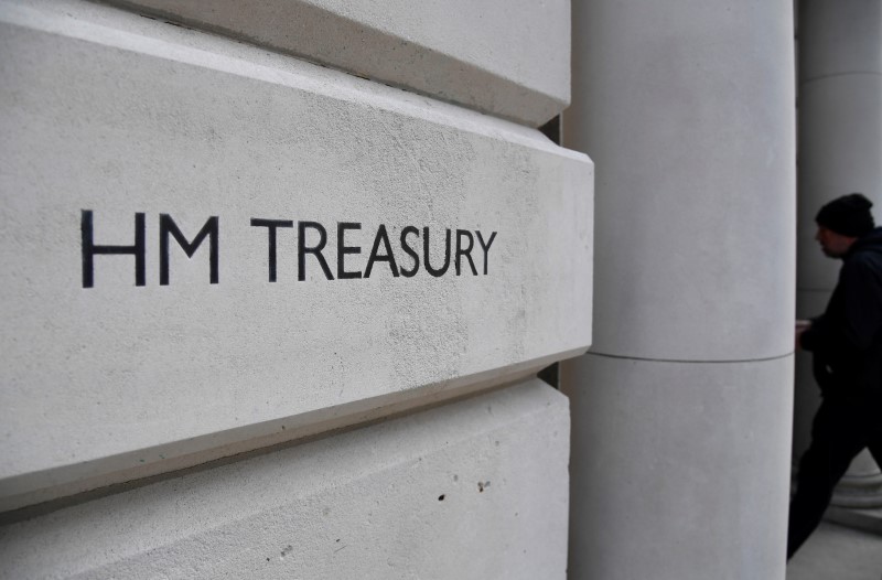 &copy; Reuters. FILE PHOTO:  A sign is seen engraved on the Treasury building, ahead of Wednesday's budget being delivered by Britain's Chancellor of the Exchequer Rishi Sunak, in London, Britain, March 1, 2021. REUTERS/Toby Melville/File photo