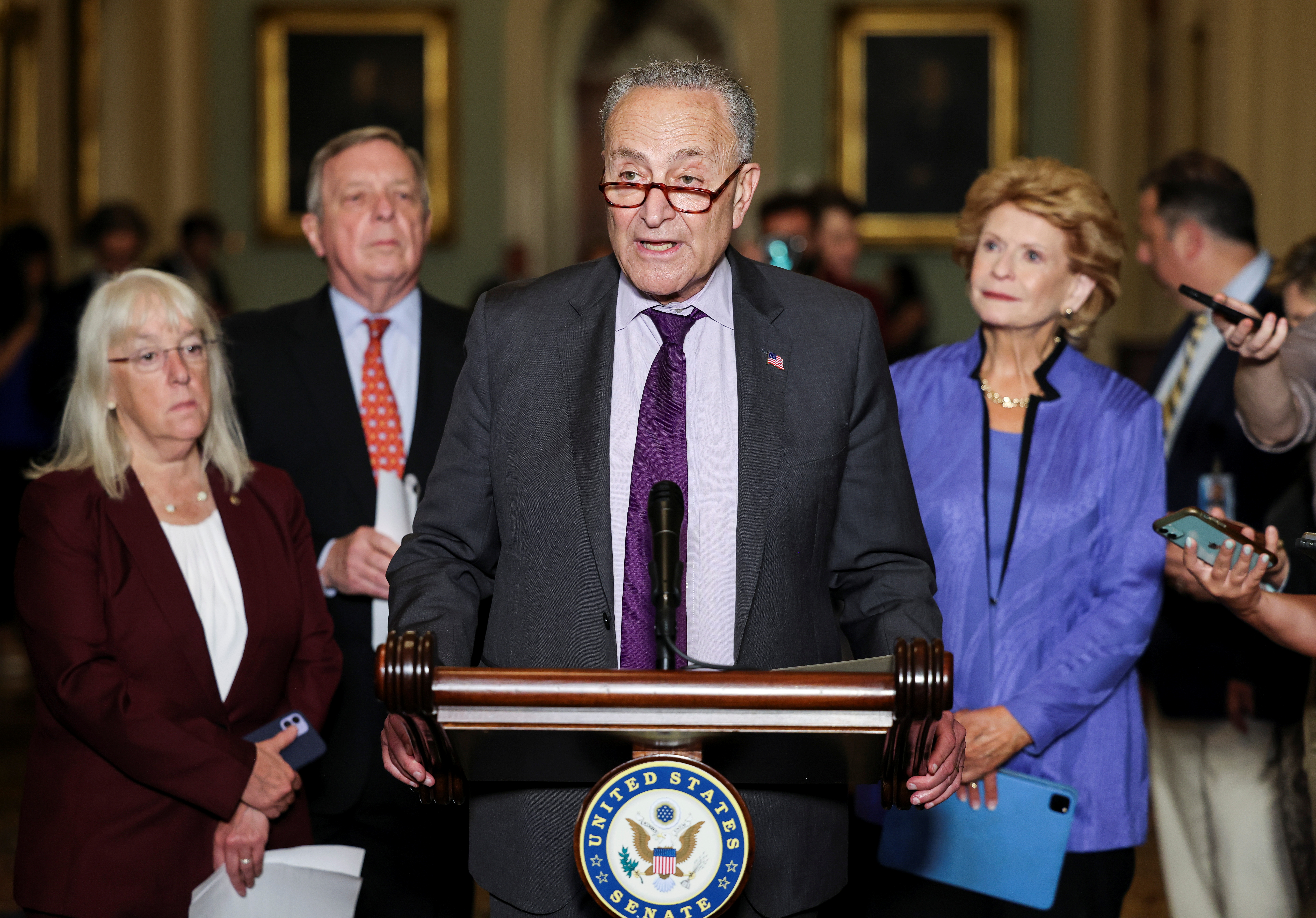 &copy; Reuters. FILE PHOTO: U.S. Senate Majority Leader Chuck Schumer (D-NY) is flanked by Senators'  Patty Murray (D-WA), Dick Durbin (D-IL) and Debbie Stabenow (D-MI) as he talks to reporters following the Senate Democrats weekly policy lunch at the U.S. Capitol in Was