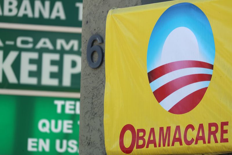 &copy; Reuters. FILE PHOTO: A sign on an insurance store advertises Obamacare in San Ysidro, San Diego, California, U.S., October 26, 2017. REUTERS/Mike Blake