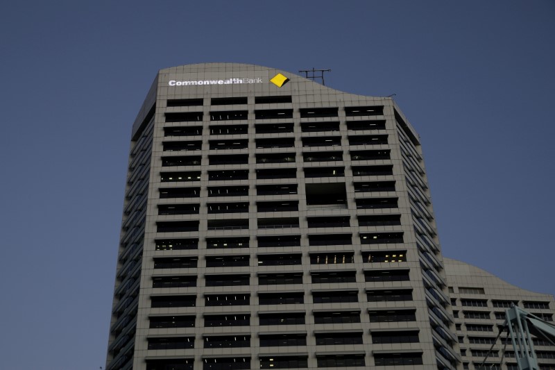 © Reuters. FILE PHOTO: An office building with the Commonwealth Bank logo is seen amidst the easing of the coronavirus disease (COVID-19) restrictions in the Central Business District of Sydney, Australia, June 3, 2020.  REUTERS/Loren Elliott