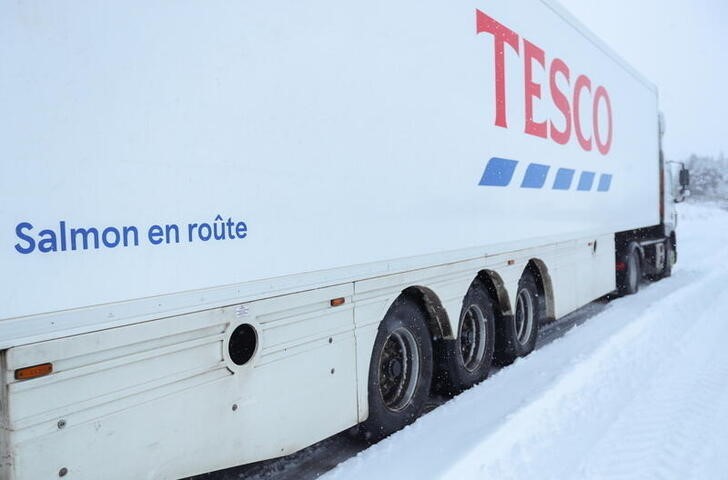 &copy; Reuters. FILE PHOTO:  A Tesco lorry is parked in the snow at the Pass of Drumochter, Scotland, Britain January 14, 2021. REUTERS/Russell Cheyne/File photo