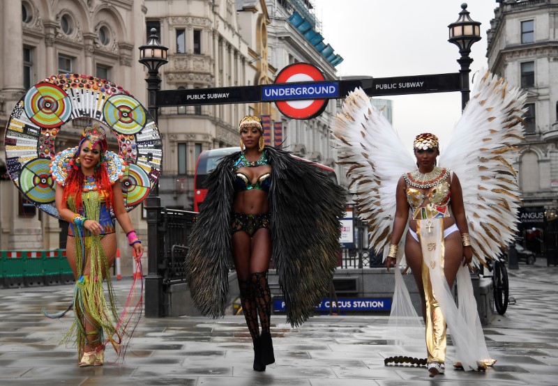&copy; Reuters. FILE PHOTO: Caribbean soca dancers display their costumes as they promote the first ever digital Notting Hill Carnival, following the cancellation of the normal Carnival festivities due to the continued spread of the coronavirus disease (COVID-19), London