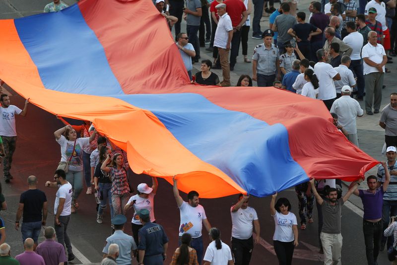 &copy; Reuters. Supporters of Civil Contract party led by Armenia's acting Prime Minister Nikol Pashinyan attend a campaign rally ahead of the upcoming snap parliamentary election in Yerevan, Armenia June 17, 2021. Hayk Baghdasaryan/Photolure via REUTERS  ATTENTION EDITO