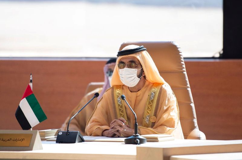 &copy; Reuters. الشيخ محمد بن راشد آل مكتوم نائب رئيس الإمارات وحاكم دبي يشارك في قمة لمجلس التعاون الخليجي في المعلا بالسعودية يوم 5 يناير كانون الثاني 2021.
(