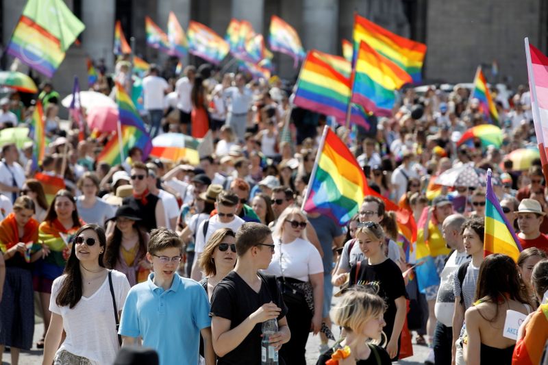 &copy; Reuters. People attend the "Equality Parade" rally in support of the LGBT community, in Warsaw, Poland June 19, 2021. REUTERS/Kacper Pempel
