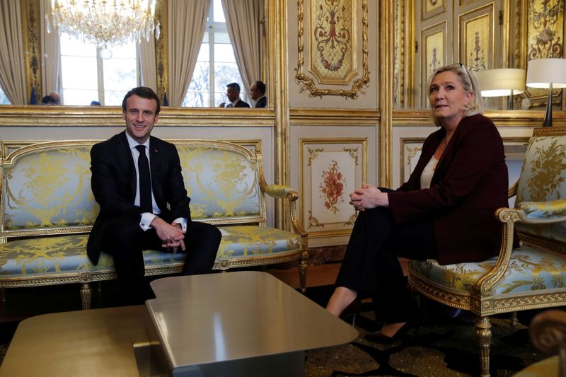 &copy; Reuters. FILE PHOTO: French President Emmanuel Macron attends a meeting with French far-right National Rally (Rassemblement National) party leader Marine Le Pen at the Elysee Palace in Paris, France, February 6, 2019. REUTERS/Philippe Wojazer/Pool/File Photo