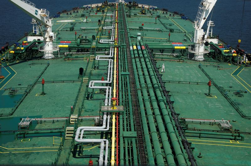 &copy; Reuters. FILE PHOTO: Pipelines run down the deck of Hin Leong's Pu Tuo San VLCC supertanker in the waters off Jurong Island in Singapore July 11, 2019.  Picture taken July 11, 2019.  REUTERS/Edgar Su/File Photo