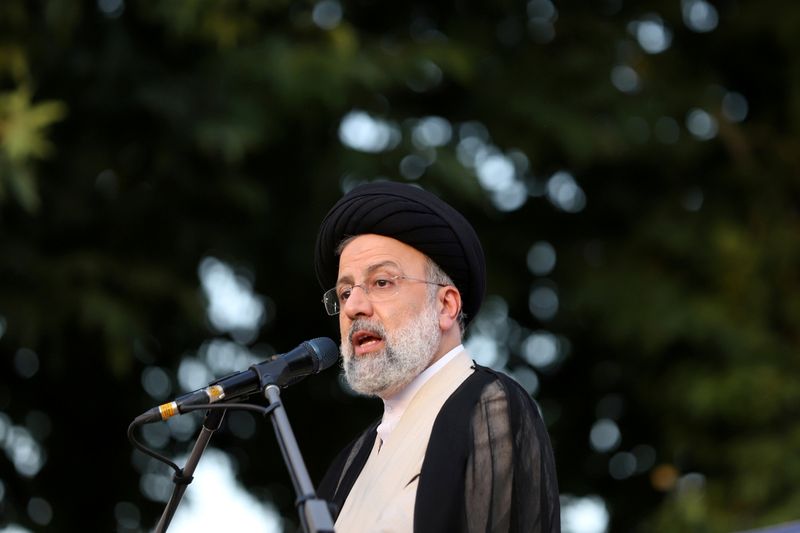 &copy; Reuters. FILE PHOTO: Presidential candidate Ebrahim Raisi speaks during a campaign rally in Tehran, Iran June 15, 2021. Majid Asgaripour/WANA (West Asia News Agency) via REUTERS