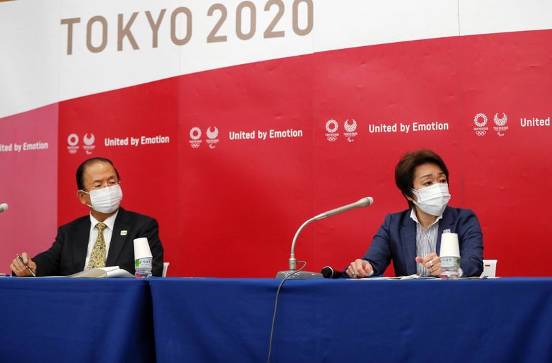 &copy; Reuters. Tokyo 2020 Olympics Organising Committee President Seiko Hashimoto and CEO Toshiro Muto attend a news conference after a meeting with local municipalities working group hosted by the government in Tokyo, Japan, June 23, 2021, on the day to mark one month 