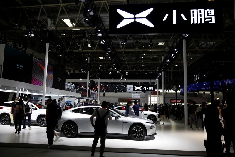 &copy; Reuters. Cars are displayed at EV startup Xpeng's booth at the Beijing International Automotive Exhibition, or Auto China show, in Beijing, China September 27,  2020. REUTERS/Tingshu Wang/Files