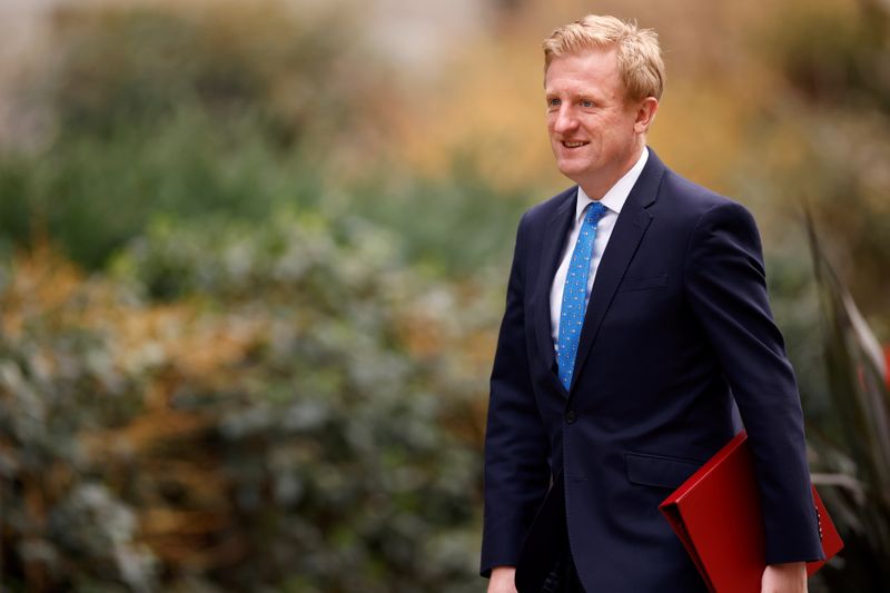 &copy; Reuters. FILE PHOTO: Britain's Secretary of State for Digital, Culture, Media and Sport Oliver Dowden walks outside Downing Street in London, Britain, February 24, 2021. REUTERS/John Sibley