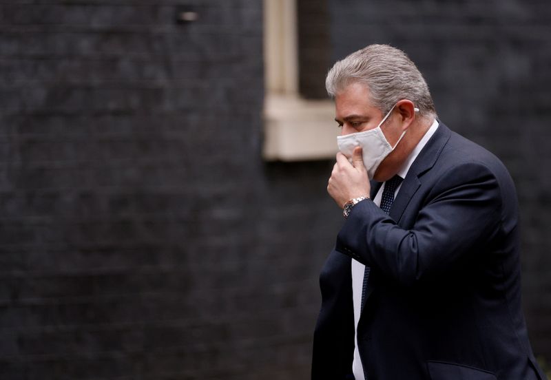 &copy; Reuters. FILE PHOTO: Secretary of State for Northern Ireland Brandon Lewis is seen outside Downing Street in London, Britain, February 3, 2021. REUTERS/John Sibley/File Photo