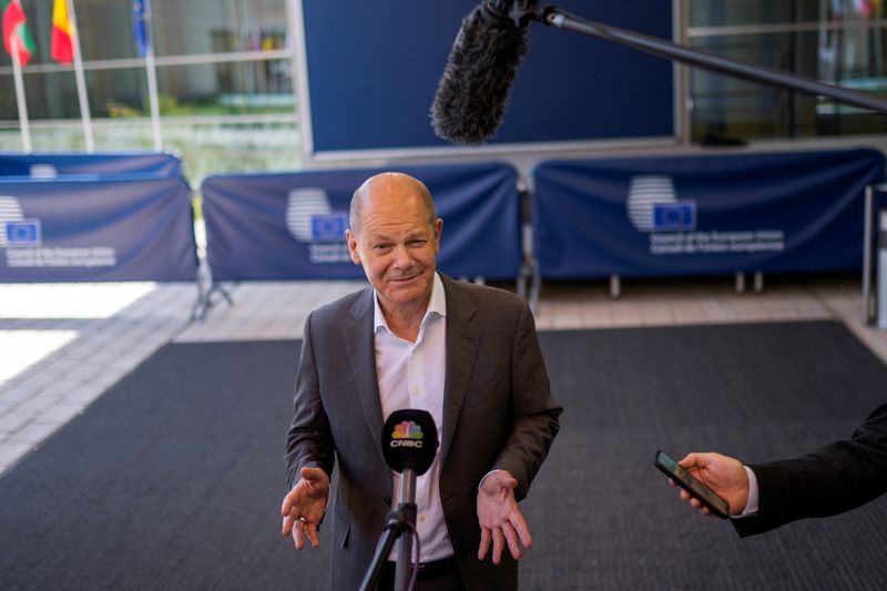 &copy; Reuters. FILE PHOTO: German Finance Minister Olaf Scholz talks to journalists as he arrives to a meeting of Eurogroup Finance Ministers at the European Council building in Luxembourg, Luxembourg June 17, 2021. Francisco Seco/Pool via REUTERS