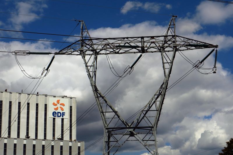 &copy; Reuters. FILE PHOTO: Electrical power pylons of high-tension electricity power lines are seen next to the EDF power plant in Bouchain, near Valenciennes, France, July 7, 2020. REUTERS/Pascal Rossignol