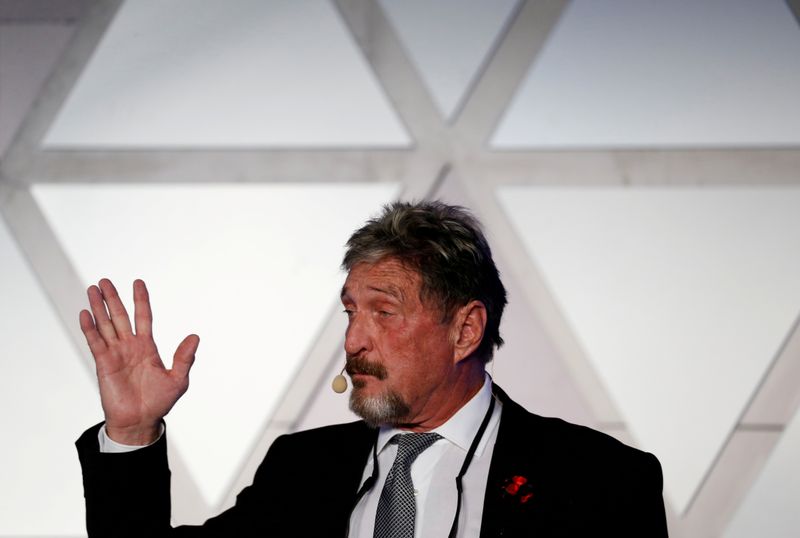 &copy; Reuters. FILE PHOTO: John McAfee, co-founder of McAfee Crypto Team and CEO of Luxcore and founder of McAfee Antivirus, speaks at the Malta Blockchain Summit in St Julian's, Malta November 1, 2018. REUTERS/Darrin Zammit Lupi/File Photo