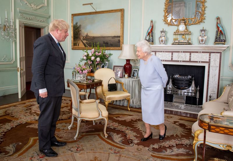 © Reuters. Britain's Queen Elizabeth II greets Prime Minister Boris Johnson at the first in-person weekly audience with the Prime Minister since the start of the coronavirus pandemic, at Buckingham Palace in London, Briain June 23, 2021. Dominic Lipinski/Pool via REUTERS