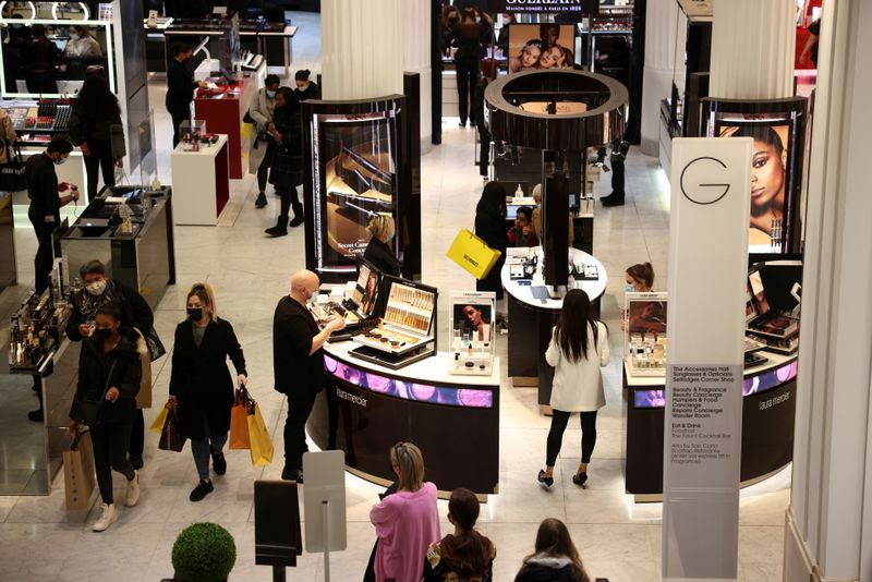 &copy; Reuters. FILE PHOTO: People shop in the Selfridges department store on Oxford street, as the coronavirus disease (COVID-19) restrictions ease, in London, Britain April 12, 2021. REUTERS/Henry Nicholls