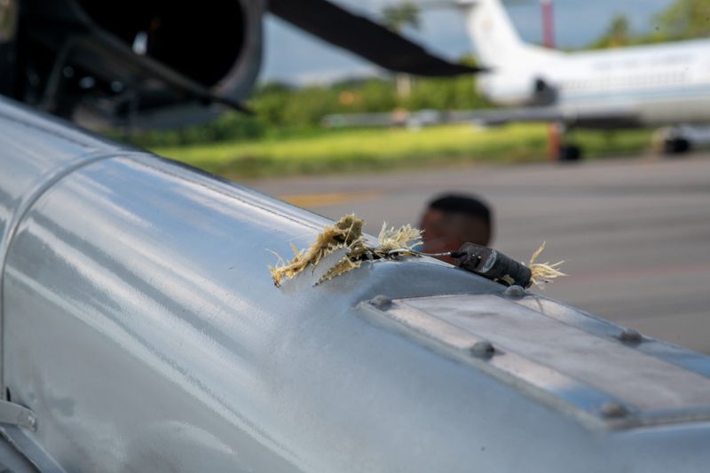&copy; Reuters. The mark of a projectile impact is seen on a helicopter that Colombian President Ivan Duque was traveling in, after it suffered an attack during an overflight, according to authorities, in Cucuta, Colombia June 25, 2021. Colombia Presidency/Handout via RE