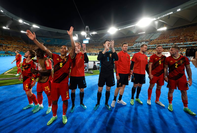 &copy; Reuters. لاعبو بلجيكا يحتفلون بعد مباراة فريقهم أمام البرتغال حاملة في بطولة أوروبا لكرة القدم 2020 يوم الأحد. صورة لرويترز من ممثل لوكالات الأنباء.