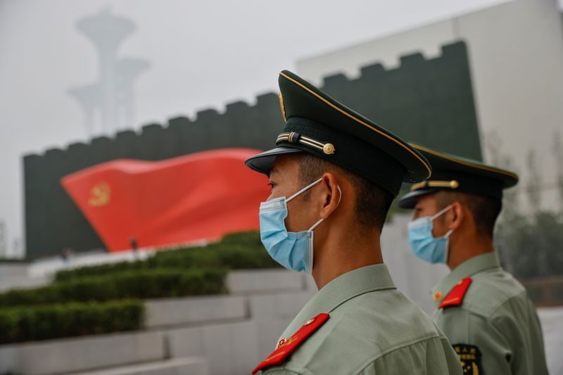 &copy; Reuters. Officers of the People's Armed Police stand guard outside the Museum of the Communist Party of China that was opened ahead of the 100th founding anniversary of Party in Beijing, China June 25, 2021.  REUTERS/Thomas Peter