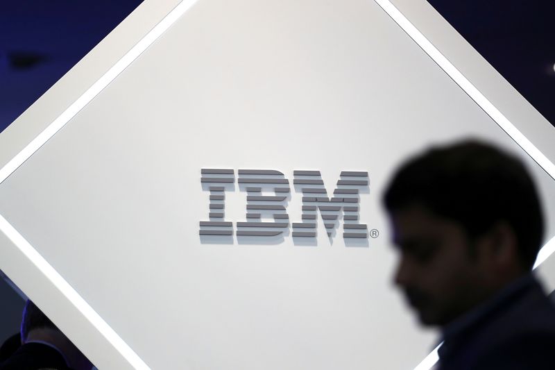 &copy; Reuters. FILE PHOTO: A man stands near an IBM logo at the Mobile World Congress in Barcelona, Spain, February 25, 2019. REUTERS/Sergio Perez/File Photo  