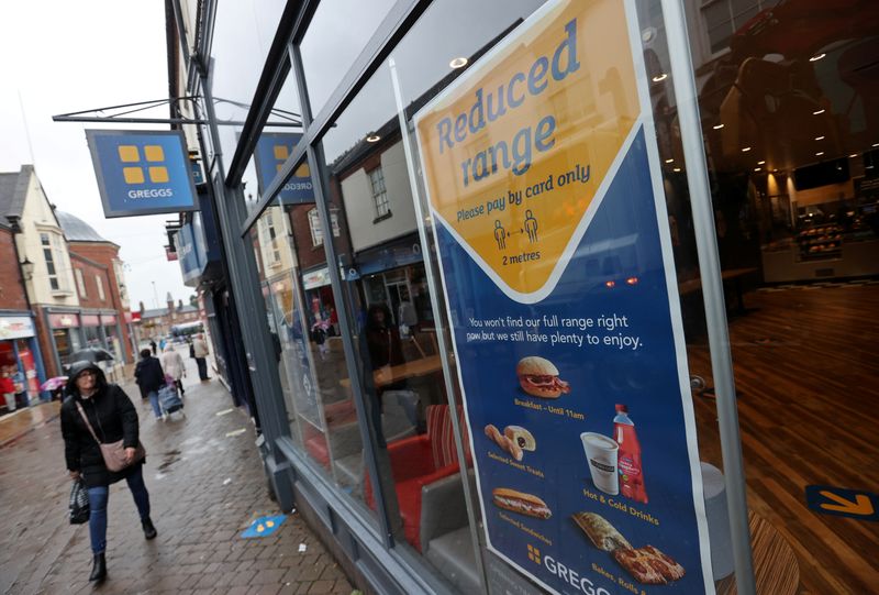 &copy; Reuters. Social distancing guidelines are seen outside a Greggs bakery shop, as it reopens following the outbreak of the coronavirus disease (COVID-19), in Newcastle-under-Lyme, Staffordshire, Britain June 18, 2020. REUTERS/Carl Recine/Files