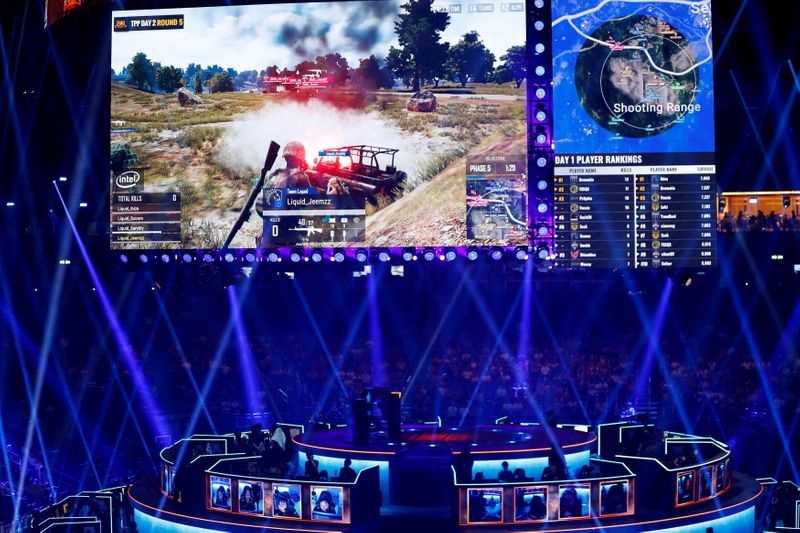 &copy; Reuters. FILE PHOTO: Players are pictured as they attend the PUBG Global Invitational 2018, the first official esports tournament for the computer game PlayerUnknown's Battlegrounds in Berlin, Germany, July 26, 2018.  REUTERS/Fabrizio Bensch/File Photo