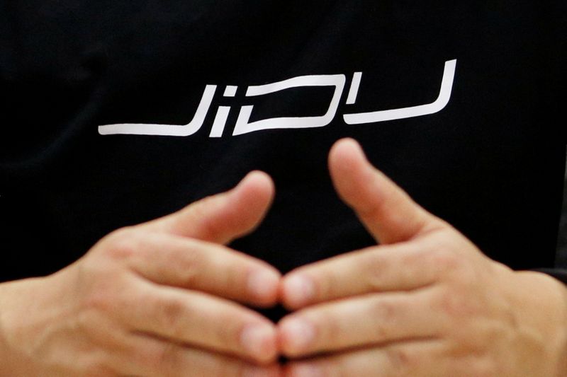 Baidu's EV firm Jidu hires ex-Cadillac designer