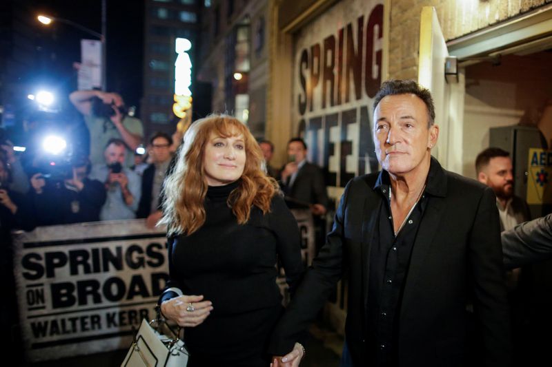 &copy; Reuters. Singers Patti Scialfa (L) and husband Bruce Springsteen exit the theatre after attending the Broadway debut of "Springsteen on Broadway" at the Walter Kerr Theatre in New York, U.S., October 12, 2017.  REUTERS/Eduardo Munoz