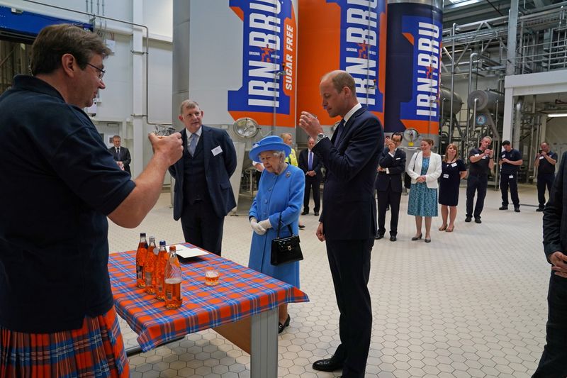 &copy; Reuters. Britain's Queen Elizabeth looks on as Prince William, Duke of Cambridge, known as the Earl of Strathearn in Scotland, tries Irn-Bru, during a visit to AG Barr's factory, where the Irn-Bru drink is manufactured, as part of her traditional trip to Scotland 