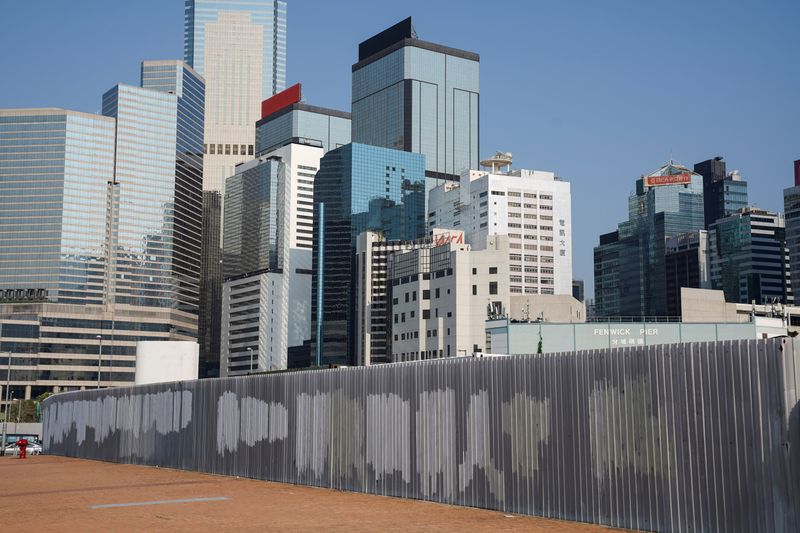 &copy; Reuters. Graffiti has been removed off a fence in Hong Kong's financial district, the site of many 2019 protests, Hong Kong, China, April 23, 2021. REUTERS/Lam Yik      