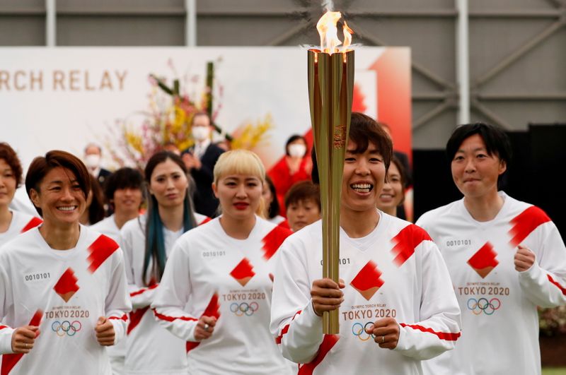 &copy; Reuters. Revezamento da tocha olímpica em Naraha, na região de Fukushima, no Japão
25/03/2021 REUTERS/Kim Kyung-Hoon/Pool