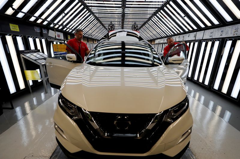 &copy; Reuters. FILE PHOTO: Workers are seen on the production line at Nissan's car plant in Sunderland Britain, October 10, 2019. REUTERS/Phil Noble