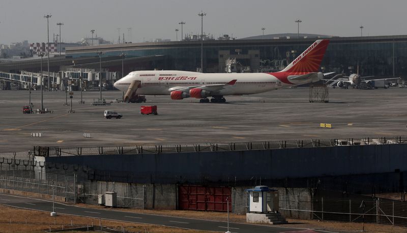 © Reuters. FILE PHOTO: An Air India Boeing 747-400 aircraft is seen parked on the tarmac at Chhatrapati Shivaji Maharaj International Airport in Mumbai, India, January 30, 2020. REUTERS/Francis Mascarenhas