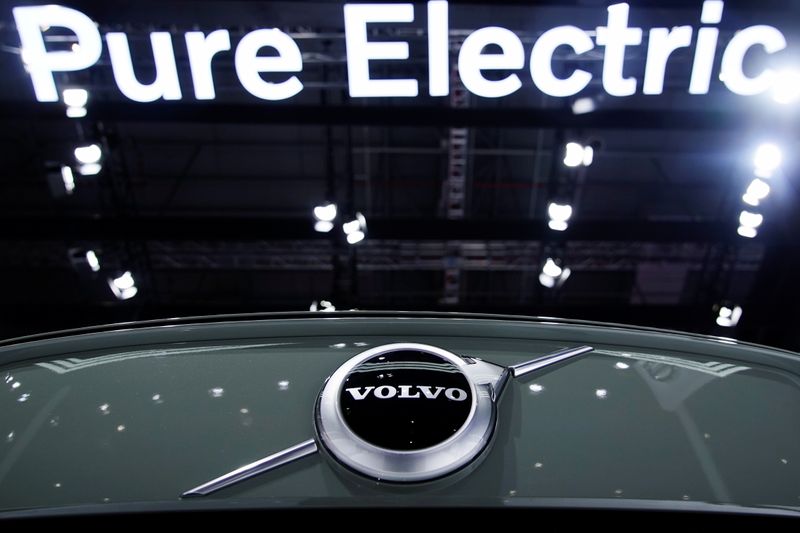 &copy; Reuters. A Pure Electric sign is seen above a Volvo vehicle displayed during a media day for the Auto Shanghai show in Shanghai, China April 20, 2021. REUTERS/Aly Song