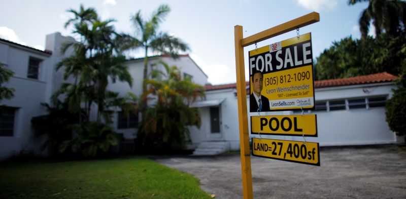 &copy; Reuters. FILE PHOTO: A for sale sign sits outside a house in Miami Beach October 22, 2009. REUTERS/Carlos Barria