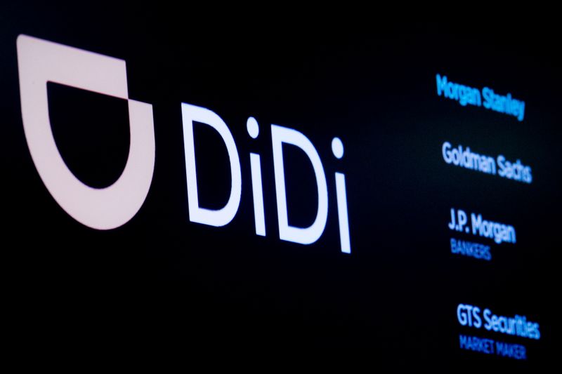 © Reuters. The logo for Chinese ride-hailing company Didi Global Inc is pictured during the IPO on the New York Stock Exchange (NYSE) floor in New York City, U.S., June 30, 2021.  REUTERS/Brendan McDermid