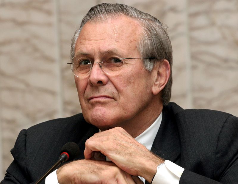 &copy; Reuters. FILE PHOTO: U.S. Defence Secretary Donald Rumsfeld listens to a question during a news conference after meeting with Kyrgyz acting President Kurmanbek Bakiyev in Bishkek, April 14, 2005. REUTERS/Vladimir Pirogov/File Photo