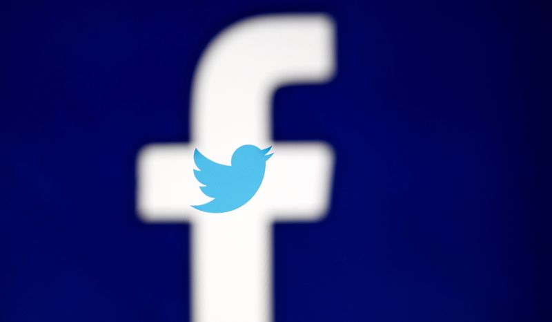 &copy; Reuters. A 3D-printed Facebook logo is displayed in front of the Twitter logo, in this illustration taken October 25, 2017. REUTERS/Dado Ruvic/Illustration