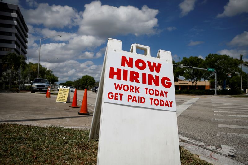 U.S. June payrolls top expectations, wage growth looks on the moderate side