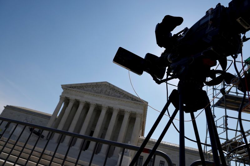&copy; Reuters. FILE PHOTO: A network television camera is trained on the U.S. Supreme Court building in Washington, U.S. May 17, 2021.  REUTERS/Jonathan Ernst/File Photo