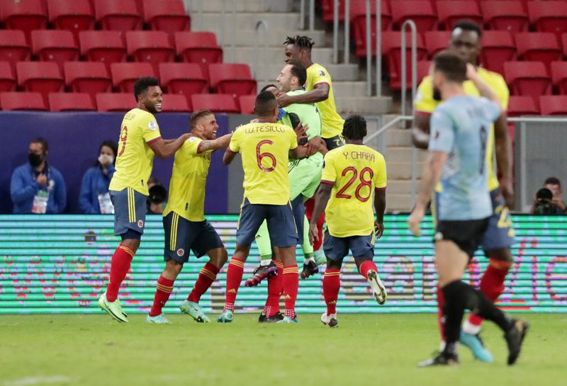 &copy; Reuters. 　サッカーの南米選手権は３日、各地で準々決勝の試合を行い、コロンビアはブラジリアでウルグアイとのＰＫ戦を制し、準決勝に進んだ（２０２１年　ロイター/Henry Romero）