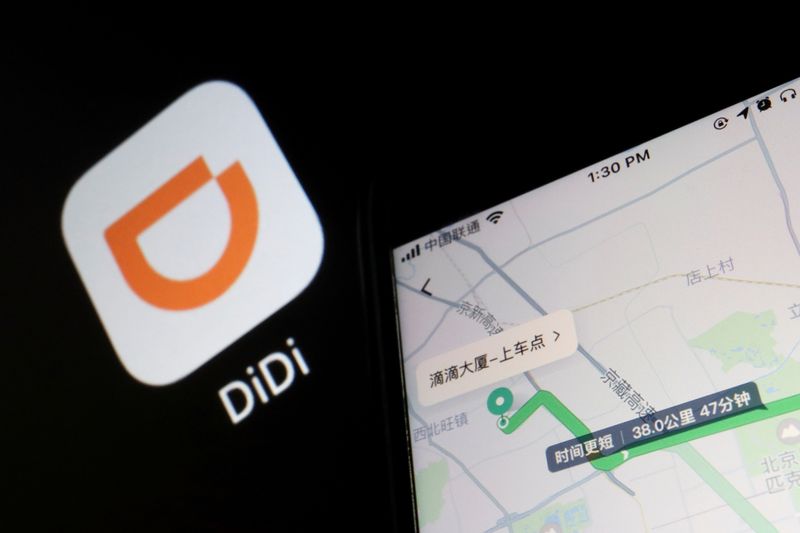 &copy; Reuters. FILE PHOTO: A navigation map on the app of Chinese ride-hailing giant Didi is seen on a mobile phone in front of the app logo displayed in this illustration picture taken July 1, 2021. REUTERS/Florence Lo/Illustration