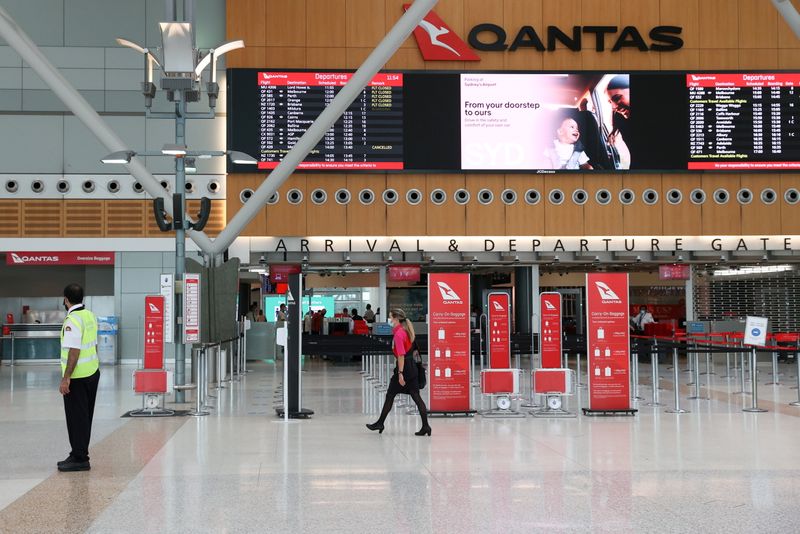 &copy; Reuters. FILE PHOTO: A mostly empty domestic terminal at Sydney Airport is seen after surrounding states shut their borders to New South Wales in response to an outbreak of the coronavirus disease (COVID-19) in Sydney, Australia, December 21, 2020.  REUTERS/Loren 