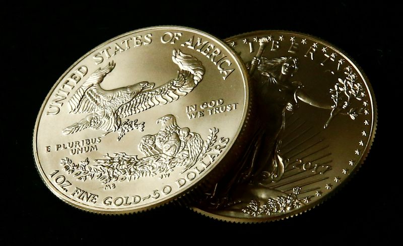 &copy; Reuters. Gold U.S. dollar bullion coins are seen in this photo illustration taken in Moscow, Russia, August 4, 2017. Picture taken August 4, 2017. REUTERS/Maxim Shemetov/Illustration