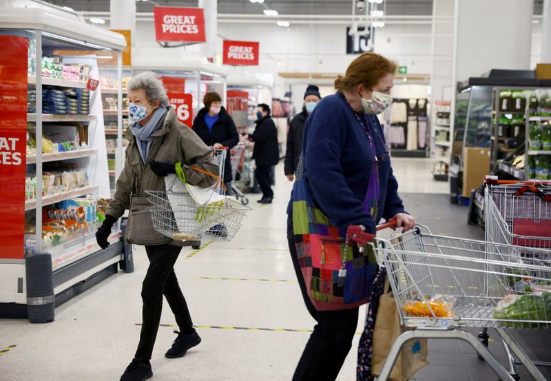 &copy; Reuters. FILE PHOTO: People shop at a Sainsbury's supermarket, amid the coronavirus disease (COVID-19) outbreak, in London, Britain January 12, 2021. REUTERS/Henry Nicholls/File Photo