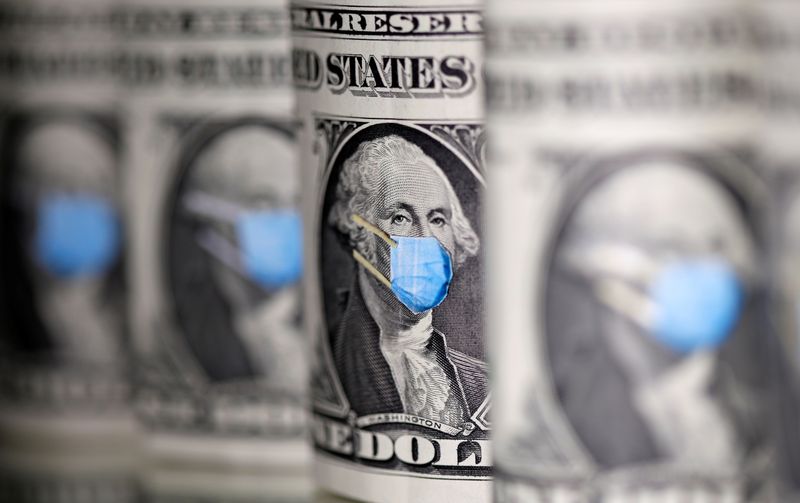 © Reuters. FILE PHOTO: George Washington is seen with printed medical mask on the one Dollar banknotes in this illustration taken, March 31, 2020. REUTERS/Dado Ruvic/Illustration