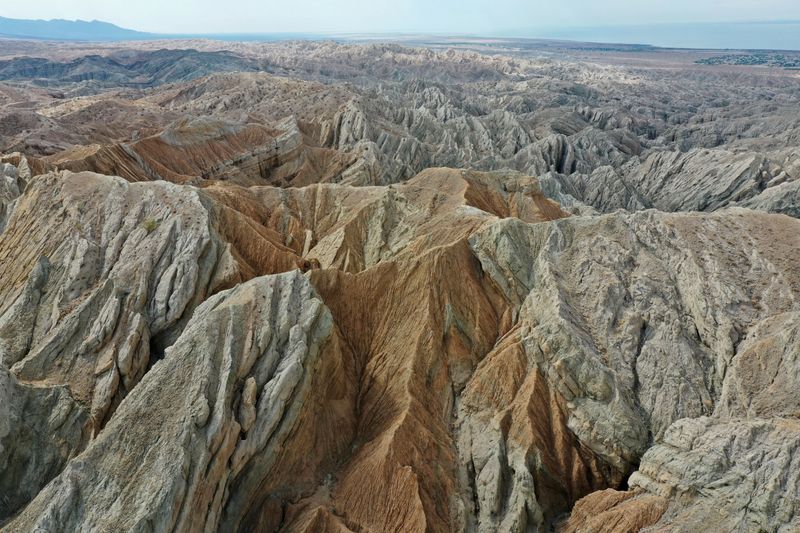 &copy; Reuters. An aerial view shows different rocks and minerals above the San Andreas Faults where the North American Plate and the Pacific Plate collide near the Salton Sea in Mecca, California, U.S., July 4, 2021.  REUTERS/Aude Guerrucci      